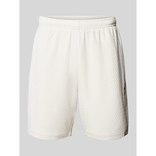 Szorty z dzianiny dresowej o kroju regular fit z fakturowanym wzorem model ‘WYTON’ ze sklepu Peek&Cloppenburg  w kategorii Spodenki męskie - zdjęcie 173862948