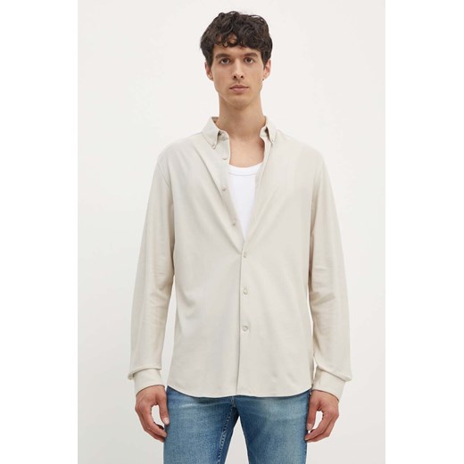 Calvin Klein koszula bawełniana męska kolor beżowy regular z kołnierzykiem button-down K10K113311 ze sklepu ANSWEAR.com w kategorii Koszule męskie - zdjęcie 173953658