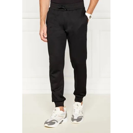 GUESS ACTIVE Spodnie dresowe SHEEN CUFFED | Regular Fit ze sklepu Gomez Fashion Store w kategorii Spodnie męskie - zdjęcie 173964867