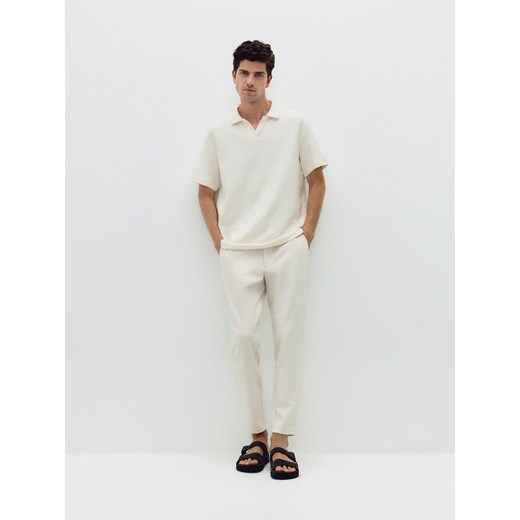 Reserved - Spodnie chino slim fit - złamana biel Reserved S Reserved