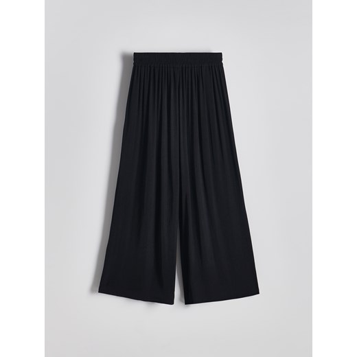 Reserved - Spodnie z szerokimi nogawkami - czarny - id: 008BV-99X - marki Reserved - 174178329 Reserved - Spodnie z szerokimi nogawkami - czarny ze sklepu Reserved w kategorii Spodnie damskie - zdjęcie 174178329