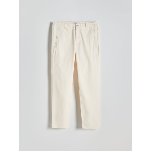 Spodnie męskie białe Reserved 