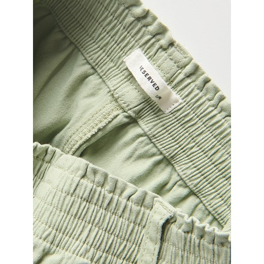 Reserved - Spodnie z łańcuszkiem - jasnozielony Reserved 128 (7-8 lat) Reserved