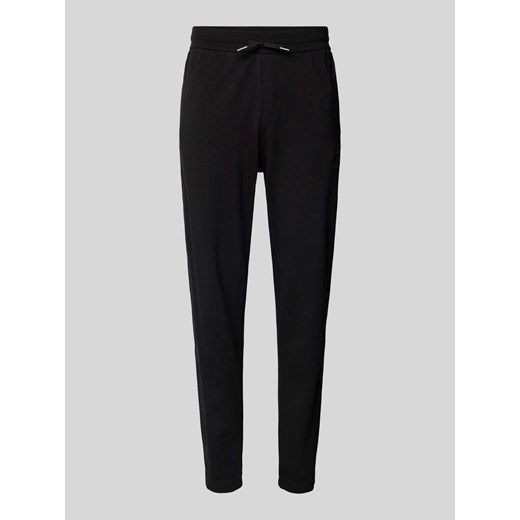 Spodnie dresowe z elastycznym ściągaczem ze sklepu Peek&Cloppenburg  w kategorii Spodnie męskie - zdjęcie 174371409