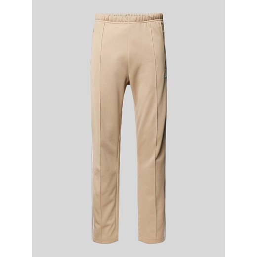 Spodnie treningowe o kroju regular fit z kieszeniami zapinanymi na zamek błyskawiczny ze sklepu Peek&Cloppenburg  w kategorii Spodnie męskie - zdjęcie 174372758