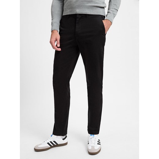 Tommy Hilfiger Spodnie - Denton Mężczyźni Bawełna czarny jednolity ze sklepu vangraaf w kategorii Spodnie męskie - zdjęcie 174582689