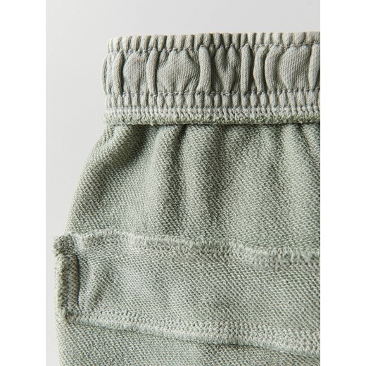 Spodnie chłopięce Reserved zielone 