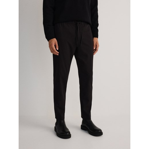 Reserved - Spodnie jogger z wiązaniem w pasie - czarny Reserved S Reserved