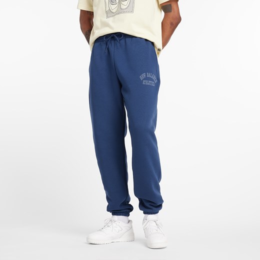 Spodnie męskie New Balance MP43505NNY – niebieskie ze sklepu New Balance Poland w kategorii Spodnie męskie - zdjęcie 174972577