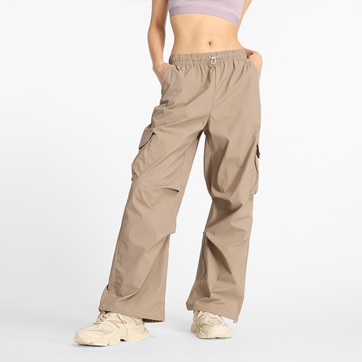 Spodnie damskie New Balance WP43534LMR – beżowe ze sklepu New Balance Poland w kategorii Spodnie damskie - zdjęcie 175005355