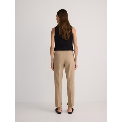 Reserved - Spodnie cygaretki w kant - beżowy Reserved 38 Reserved