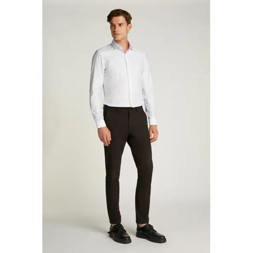 Calvin Klein Spodnie chino | Slim Fit | stretch Calvin Klein 33/34 okazyjna cena Gomez Fashion Store