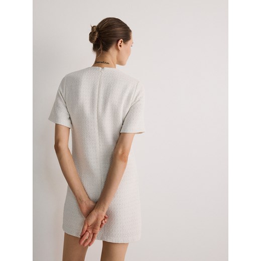 Reserved - Sukienka z ozdobnymi kokardami - złamana biel Reserved XS Reserved