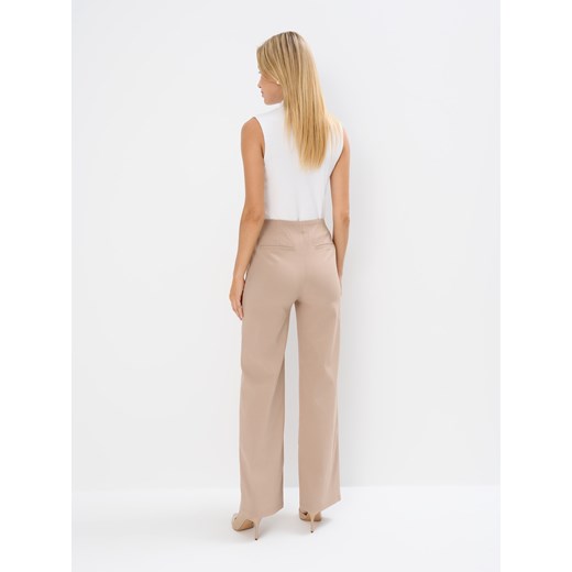 Mohito - Beżowe spodnie z szeroką nogawką - beżowy Mohito 32 Mohito