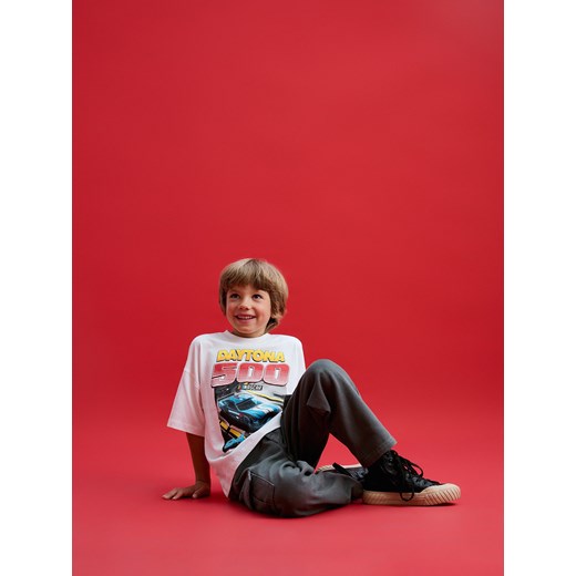 Reserved - T-shirt oversize Nascar - złamana biel Reserved 128 (7-8 lat) Reserved