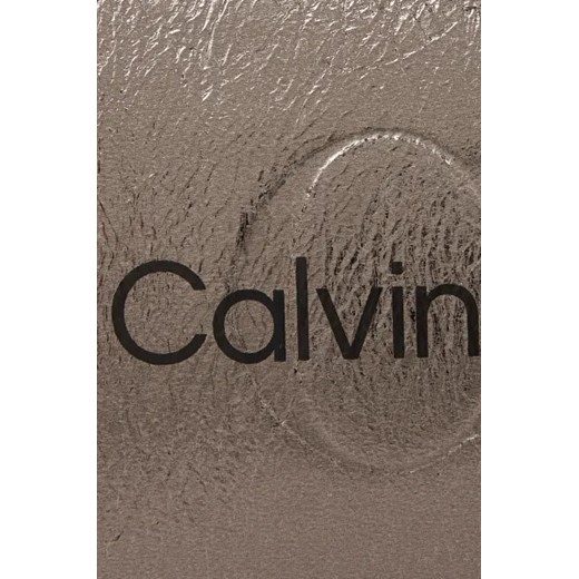 Listonoszka Calvin Klein brązowa średniej wielkości na ramię
