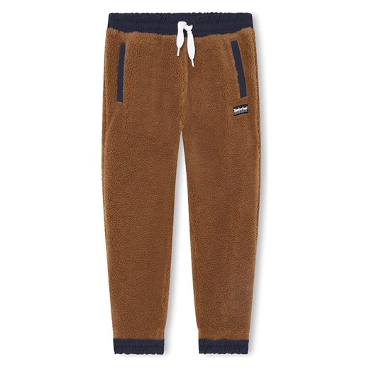 Timberland Spodnie dresowe w kolorze jasnobrązowym ze sklepu Limango Polska w kategorii Spodnie chłopięce - zdjęcie 175366918