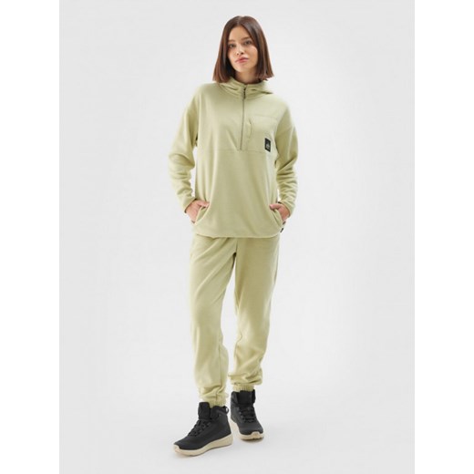 Damskie spodnie dresowe polarowe 4F 4FWAW24TTROF0818 - zielone ze sklepu Sportstylestory.com w kategorii Spodnie damskie - zdjęcie 175508058