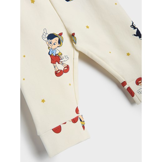 Sinsay - Legginsy Disney - kremowy Sinsay 74 Sinsay