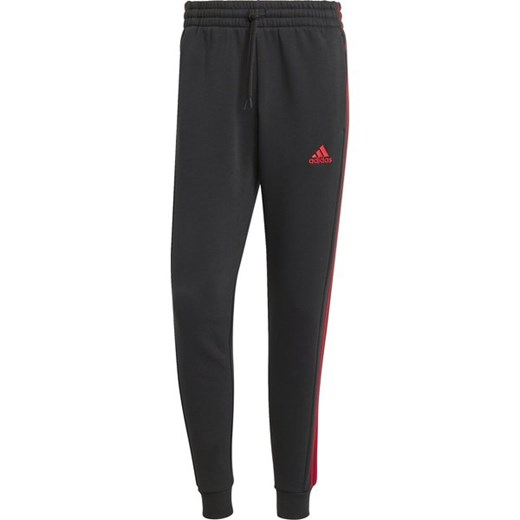Spodnie dresowe męskie Essentials Fleece 3-Stripes Tapered Cuff Adidas ze sklepu SPORT-SHOP.pl w kategorii Spodnie męskie - zdjęcie 175737099