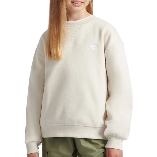 Bluza New Balance LAKG0002LIN - beżowa ze sklepu streetstyle24.pl w kategorii Bluzy dziewczęce - zdjęcie 175880636