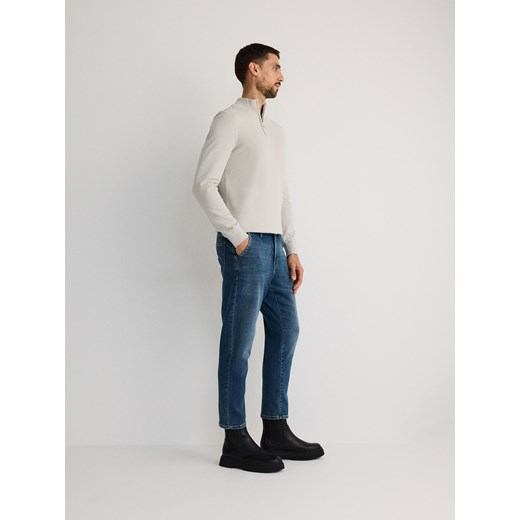 Reserved - Jeansy carrot z efektem sprania - niebieski Reserved 34 Reserved