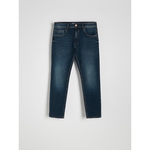 Reserved - Jeansy slim z efektem sprania - granatowy Reserved 33 Reserved