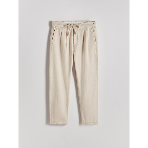 Reserved - Spodnie straight z wiązaniem - złamana biel Reserved 36 okazyjna cena Reserved