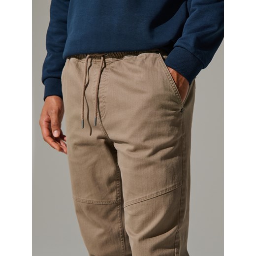 Sinsay - Spodnie - beżowy Sinsay 32 Sinsay