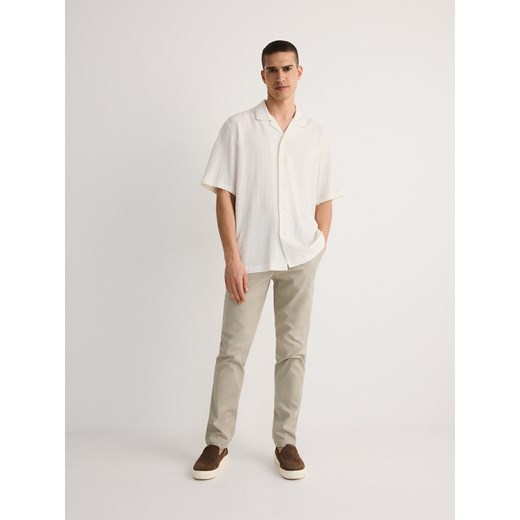 Reserved - Spodnie chino slim fit - jasnozielony Reserved 32 okazyjna cena Reserved