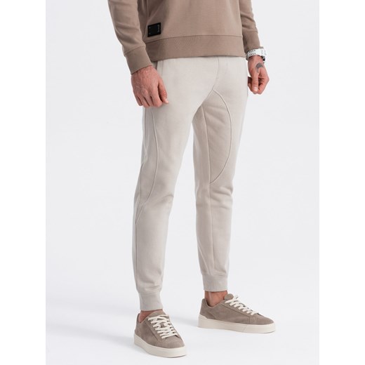 Spodnie męskie dresowe typu jogger - jasnobeżowe V1 OM-PABS-0173 M ombre