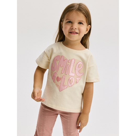 Reserved - T-shirt z nadrukiem - kremowy Reserved 98 (2-3 lata) Reserved