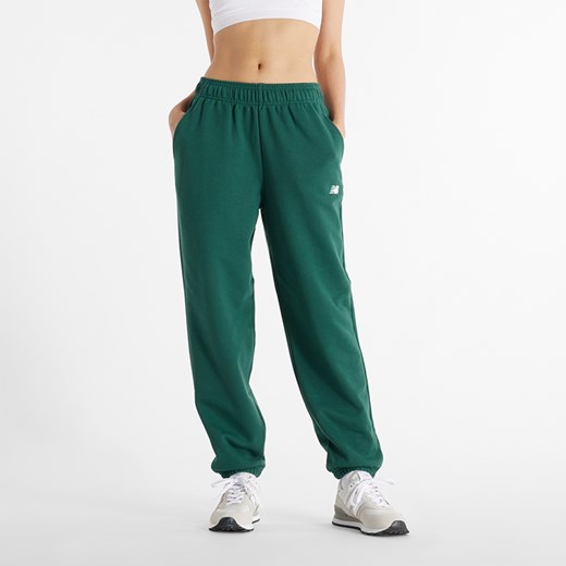 Spodnie damskie New Balance WP41500NWG – zielone ze sklepu New Balance Poland w kategorii Spodnie damskie - zdjęcie 176430169