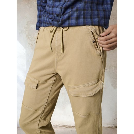 Sinsay - Spodnie - żółty Sinsay 36 Sinsay