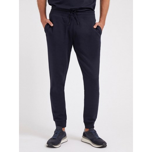Męskie spodnie dresowe GUESS ALDWIN LONG PANT ze sklepu Sportstylestory.com w kategorii Spodnie męskie - zdjęcie 176551689