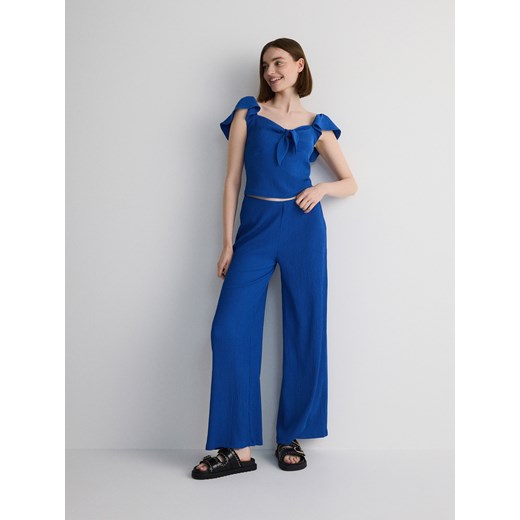 Reserved - Luźne spodnie w prążek - niebieski Reserved XL Reserved