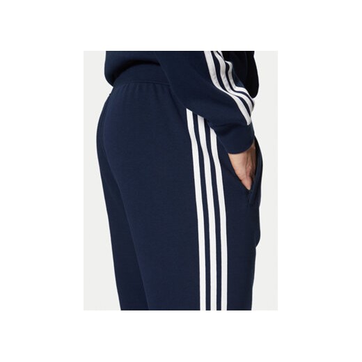 adidas Spodnie dresowe adicolor 3-Stripes IM9319 Granatowy Slim Fit M MODIVO