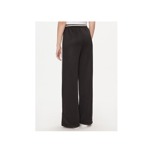 Puma Spodnie dresowe T7 For The Fanbase 625025 Czarny Relaxed Fit Puma S MODIVO