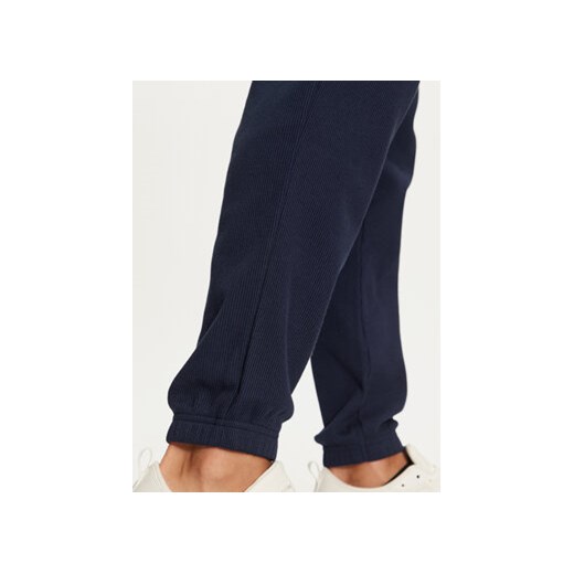 adidas Spodnie dresowe Trefoil Essentials IY2305 Granatowy Regular Fit L MODIVO