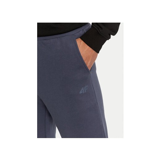 4F Spodnie dresowe 4FWMM00TTROM0942 Niebieski Regular Fit S MODIVO