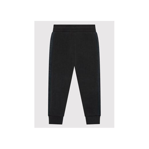 Guess Spodnie dresowe J2YQ24 FL03S Czarny Regular Fit Guess 10Y MODIVO
