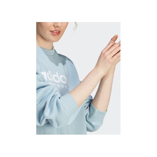 adidas Bluza ALL SZN Fleece Graphic IL3248 Błękitny Loose Fit M MODIVO