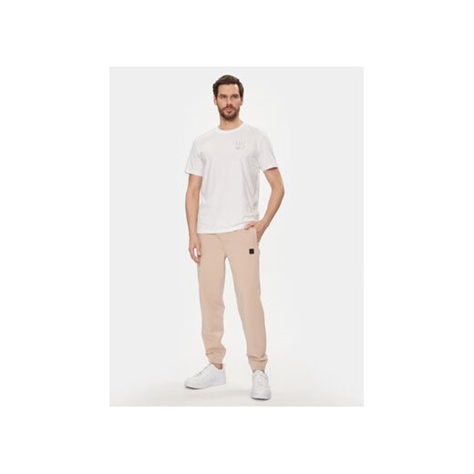 Hugo Spodnie dresowe Dimacs 50509457 Beżowy Relaxed Fit M MODIVO