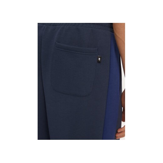 New Balance Spodnie dresowe MP43522NNY Niebieski Relaxed Fit New Balance XL MODIVO