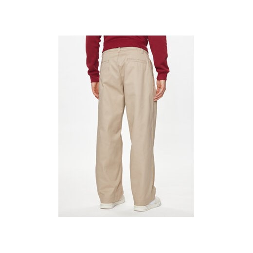 Champion Spodnie materiałowe 220013 Beżowy Wide Fit Champion M MODIVO