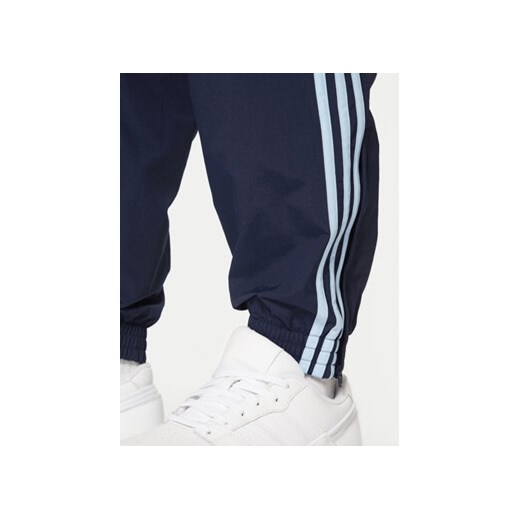 adidas Spodnie dresowe adicolor Firebird JP1249 Granatowy Regular Fit L MODIVO