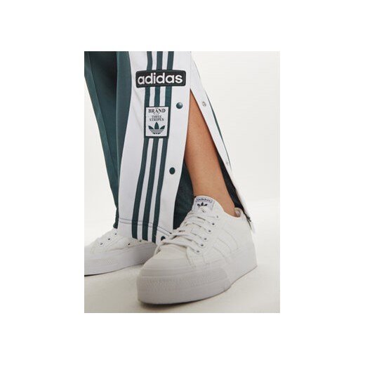 adidas Spodnie dresowe Adibreak IZ2761 Zielony Loose Fit L MODIVO