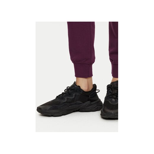 4F Spodnie dresowe 4FWMM00TTROF0945 Fioletowy Regular Fit XS MODIVO