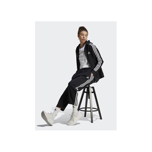 adidas Spodnie dresowe Essentials 3-Stripes Open Hem Fleece HZ5748 Czarny Loose M MODIVO