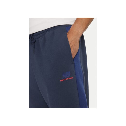 New Balance Spodnie dresowe MP43522NNY Niebieski Relaxed Fit New Balance XL MODIVO
